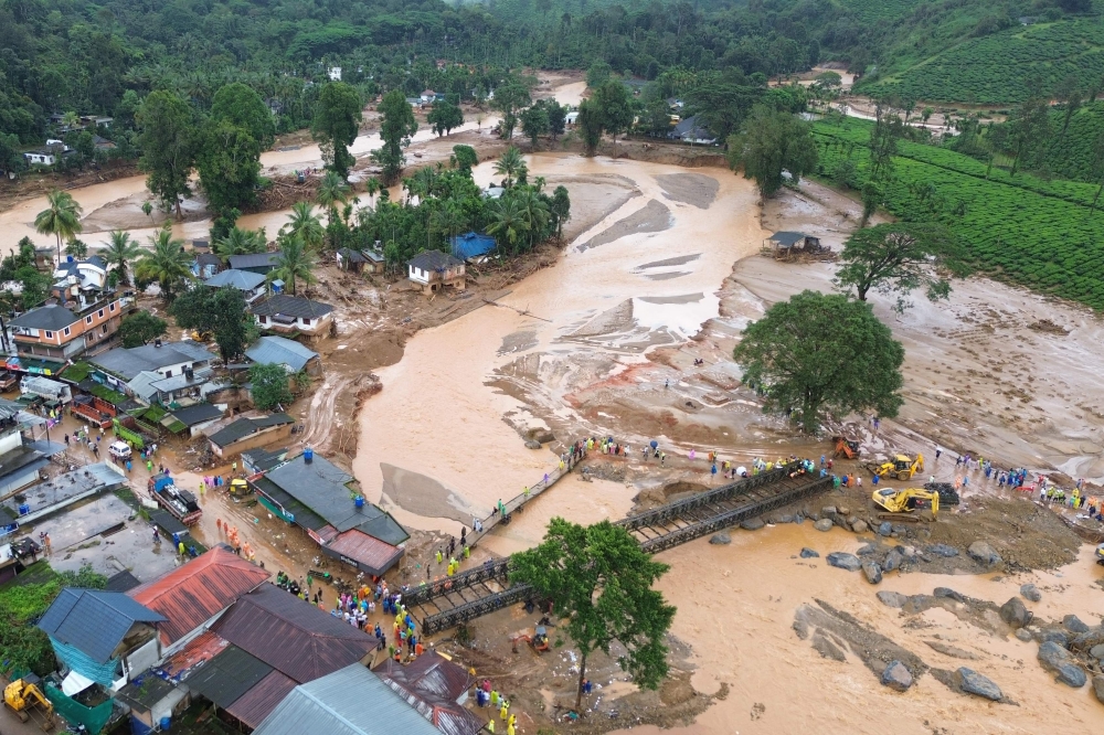 This handout photograph taken on August 1, 2024 and released by Humane Society International, India, shows an aerial view of the tea plantations after landslides in Wayanad. Photo by Hemanth Byatroy / Humane Society International, India / AFP