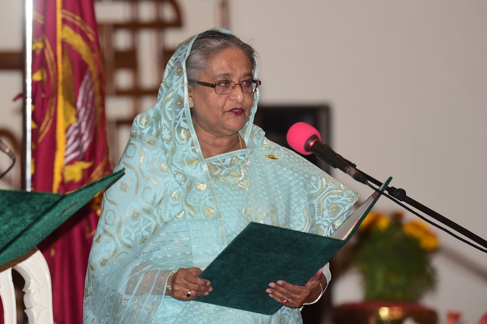 Sheikh Hasina speaks as she is sworn in for her fourth spell as Bangladesh's prime minister at the Presidential Palace in Dhaka on January 7, 2019. / AFP / Munir UZ ZAMAN