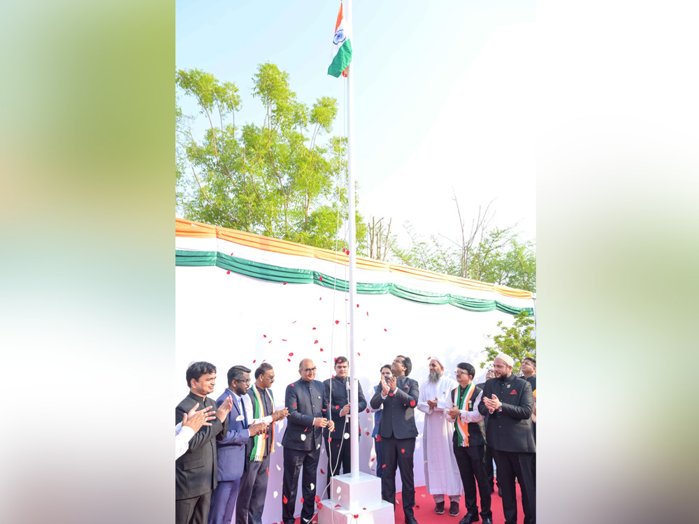 Indian Ambassador H E Vipul with other officials during the flag hoisting ceremony yesterday.