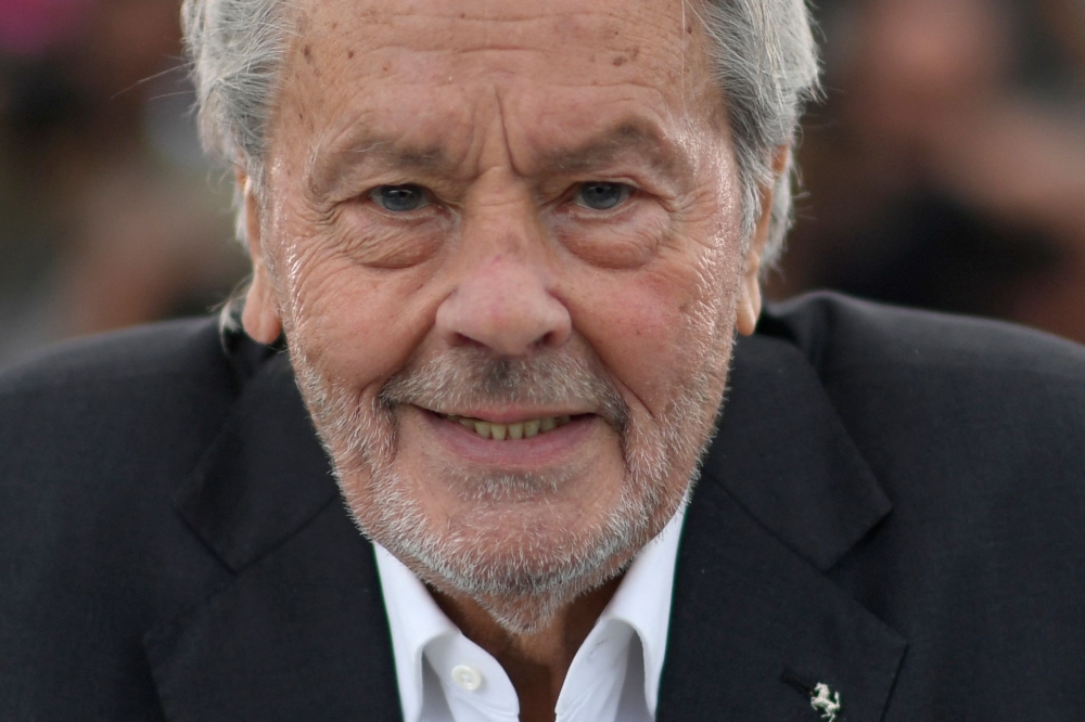 French actor Alain Delon poses during a photocall before being awarded with an Honorary Palme d'Or at the 72nd edition of the Cannes Film Festival in Cannes, southern France, on May 19, 2019. Photo by CHRISTOPHE SIMON / AFP