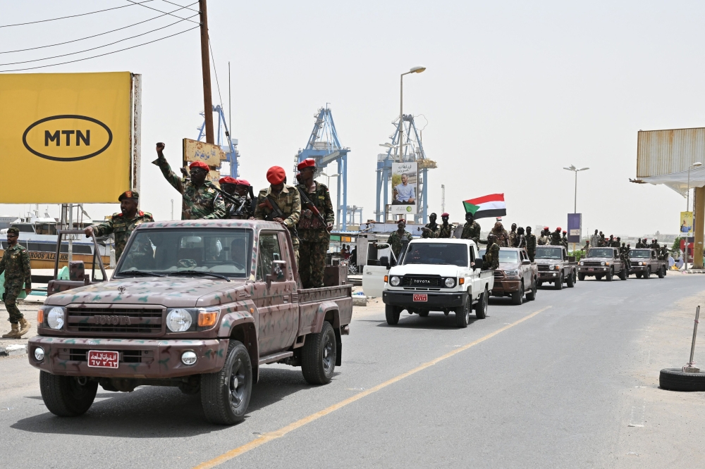 Members of Sudan's armed forces take part in a military parade held on the occasion of Army Day in Port Sudan on August 14, 2024. (Photo by AFP)