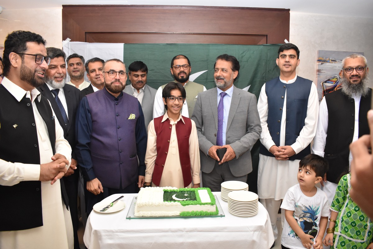 Ambassador of Pakistan H E Muhammad Aejaz (third right) with officials and guests during cake cutting ceremony to mark Independence Day of Pakistan in Doha.