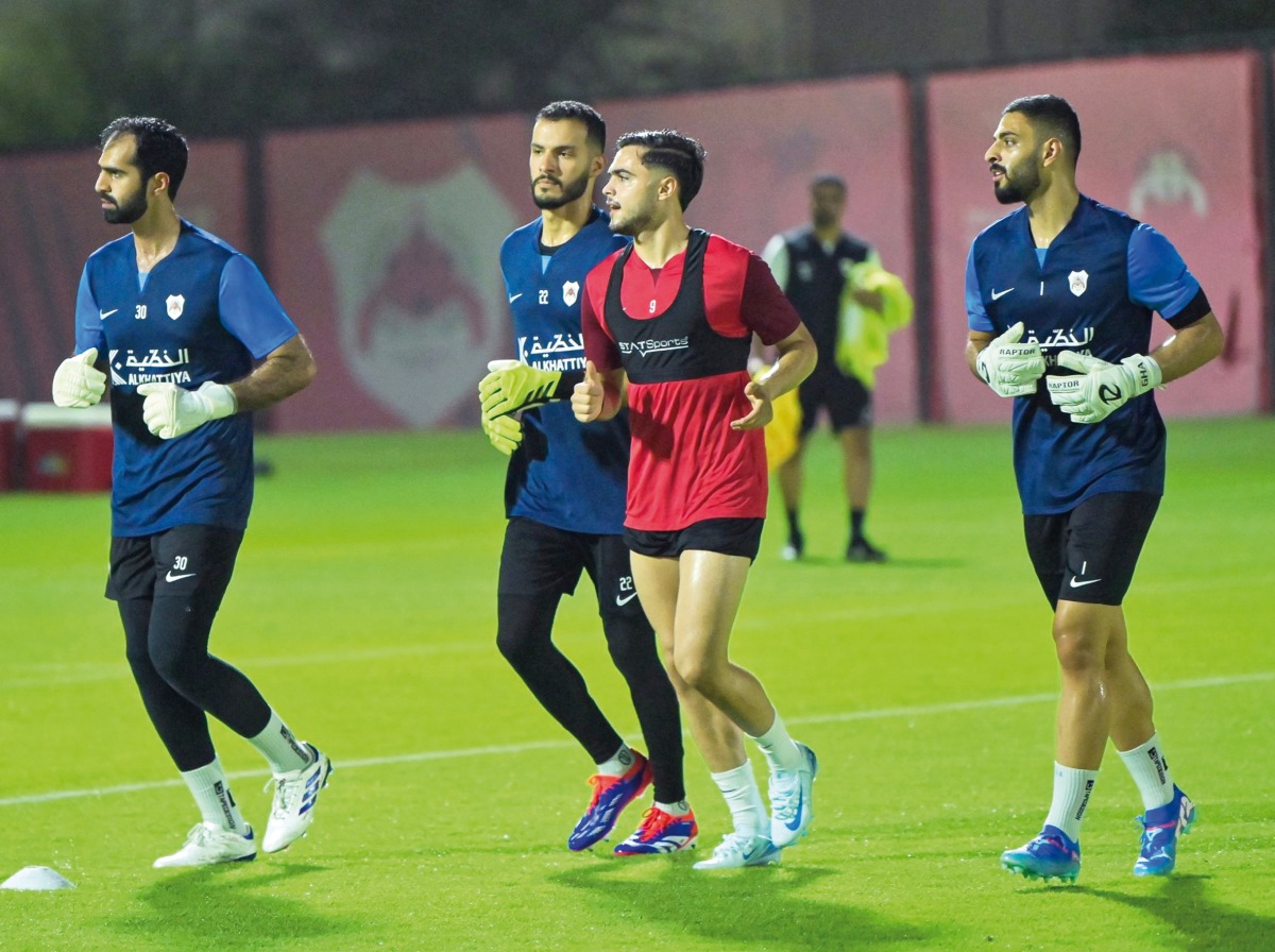 Al Rayyan players attend team's training session yesterday as they prepare for match against Al Gharafa.