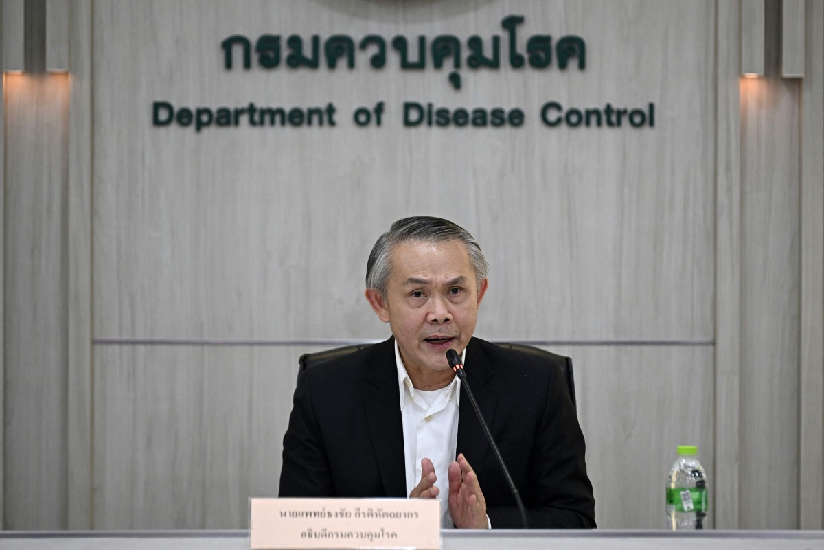 Thongchai Keeratihattayakorn, head of Thailand's Department of Disease Control, speaks during a press conference following the suspected first case of the new more dangerous strain of mpox in Bangkok on August 21, 2024. (Photo by Lillian SUWANRUMPHA / AFP)