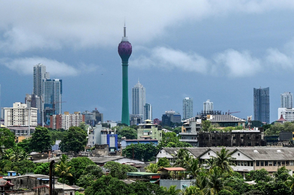 Clouds loom over the sky of Sri Lanka's capital Colombo on August 20, 2024. (Photo by Ishara S. KODIKARA / AFP)
