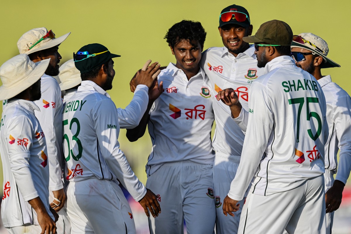 Bangladesh's players celebrate after the dismissal of Pakistan's Saim Ayub during the first day of the first Test cricket match between Pakistan and Bangladesh at the Rawalpindi Cricket Stadium in Rawalpindi on August 21, 2024. (Photo by Farooq NAEEM / AFP)
