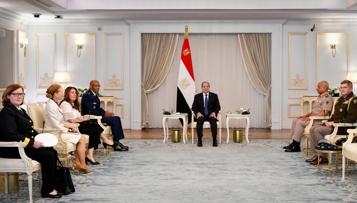 This handout picture released by the Egyptian Presidency shows Egypt's President Abdel Fattah al-Sisi (C) meeting with US Chairman of the Joint Chiefs of Staff General Charles Brown (4L) and US Ambassador to Cairo Herro Mustafa Garg (3L) in Cairo on August 25, 2024. Al-Sisi warned against further regional escalation on August 25 in a meeting with the United States' highest-ranking general, as cross-border hostilities between Israel and Lebanon intensified. (Photo by Egyptian Presidency / AFP) 