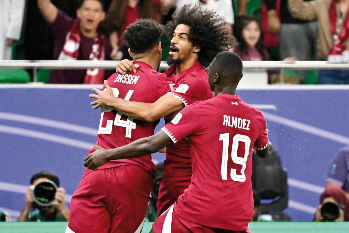 Almoez Ali (right) and Akram Afif (centre) will lead Qatar's attack during the World Cup qualifying games.    