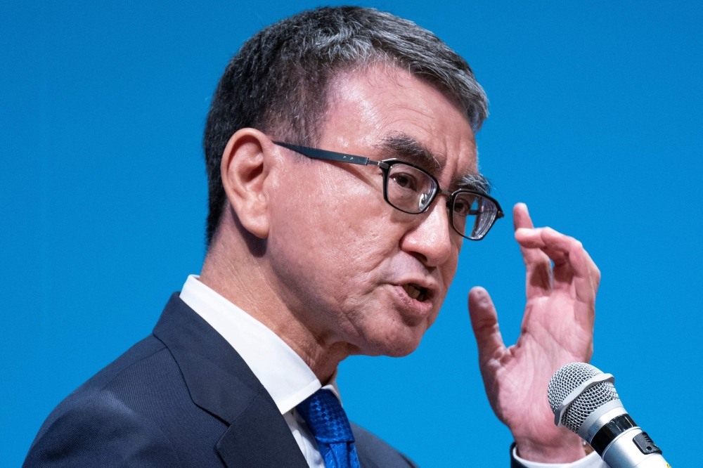 Japan's Digital Minister Taro Kono delivers a speech during a press conference to announce his intention to run in the ruling Liberal Democratic Party's presidential election, in Tokyo on August 26, 2024. (Photo by Kazuhiro NOGI / AFP)