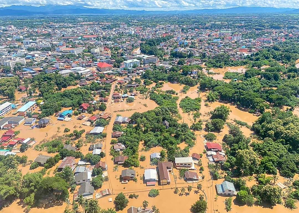 This handout photo taken on August 24, 2024 and released on August 26, 2024 by the Thailand's Department of Royal Rainmaking and Agricultural Aviation shows partially submerged houses in the aftermath of floods in Phrae Province, northern Thailand. Photo by Handout / Thailand's Department of Royal Rainmaking and Agricultural Aviation / AFP