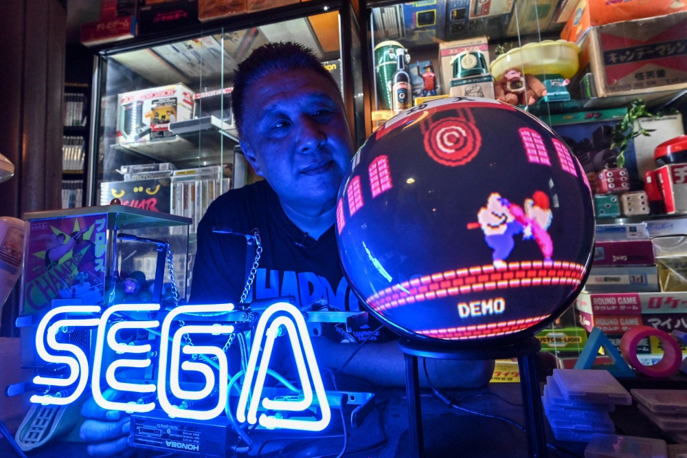This photo taken on June 24, 2024 shows vintage video game collector 