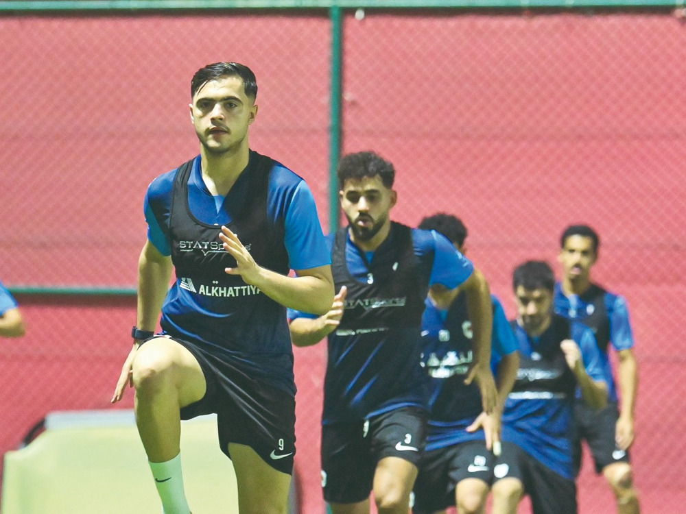 Al Rayyan’s Ahmed Al Rawi (front) trains with teammates on the eve of QSL Cup opener against Al Shahania.   