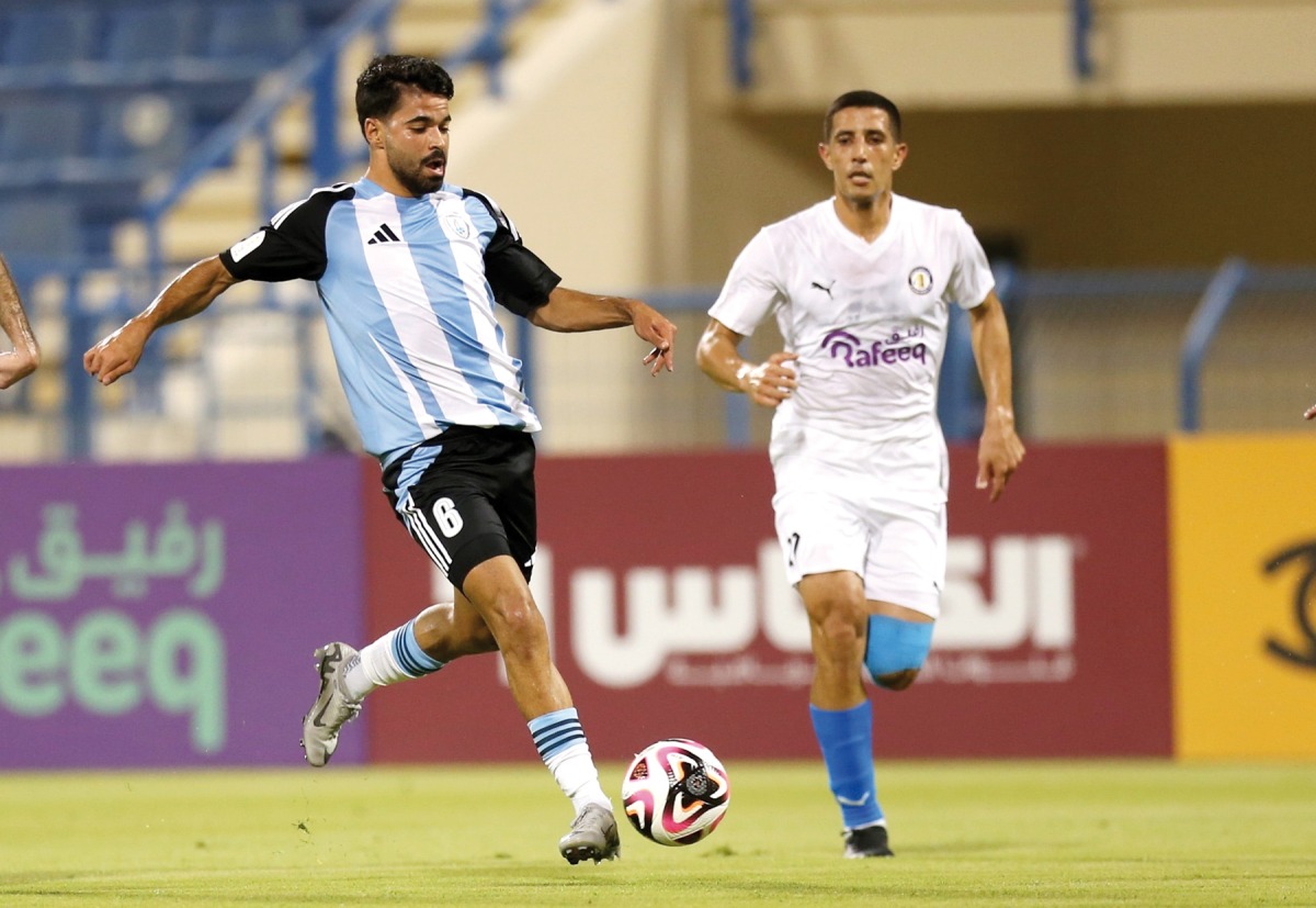 Al Wakrah's Omar Salah (left) in action during the QSL Cup Group B match against Al Khor yesterday.  