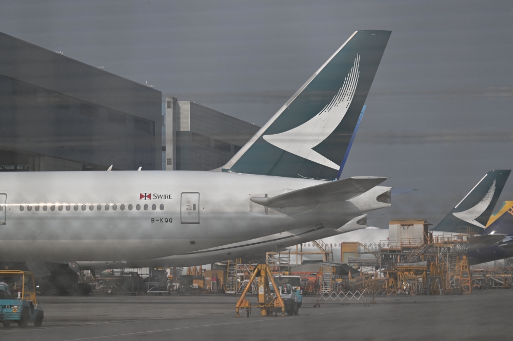 Cathay Pacific aircraft are seen in the maintenance hanger at the international airport in Hong Kong on September 3, 2024. Photo by Peter PARKS / AFP