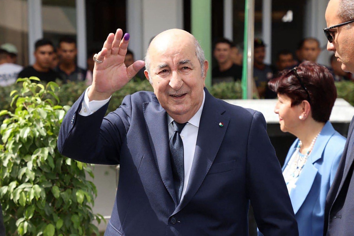 A handout picture released by the Algerian Presidency Facebook page, shows Algeria's incumbent President Abdelmadjid Tebboune leaving a polling station after voting in Algiers on September 7, 2024. Photo by ALGERIAN PRESIDENCY FACEBOOK PAGE / AFP.