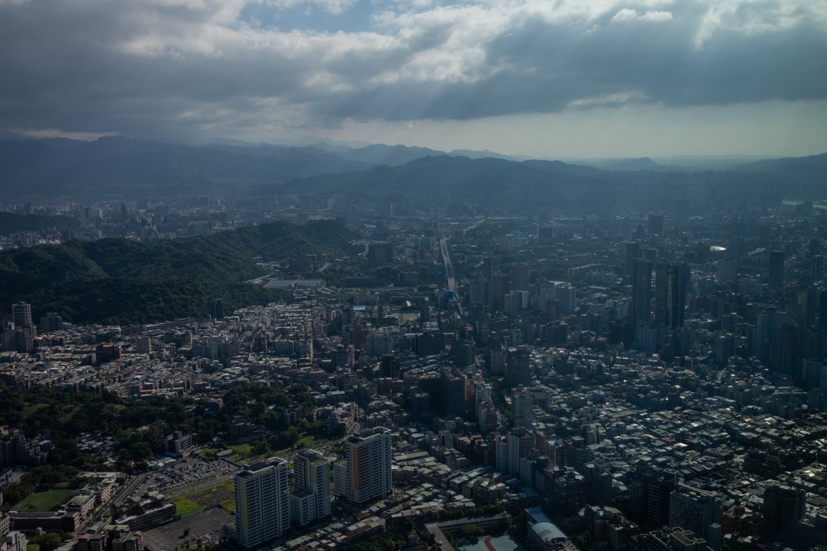 Photo used for demonstration purposes. Sunlight shines through clouds above Taipei, as seen from the 508-meter Taipei 101 skyscraper on September 3, 2024. Photo by Yan ZHAO / AFP.