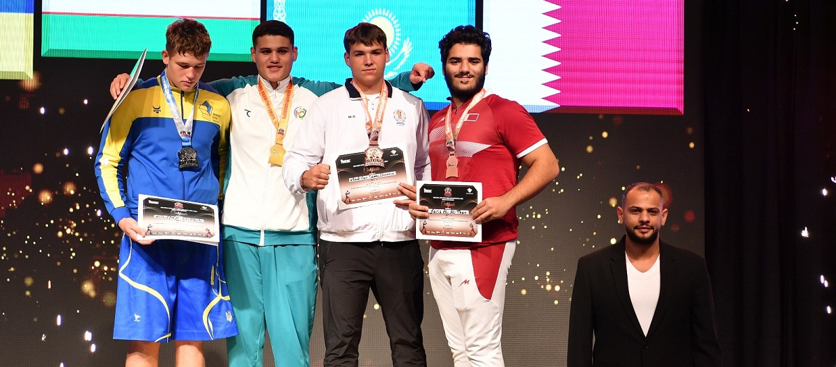 Qatar’s Faris Ali Al Thani (right) poses on the podium along with other medal winners. 