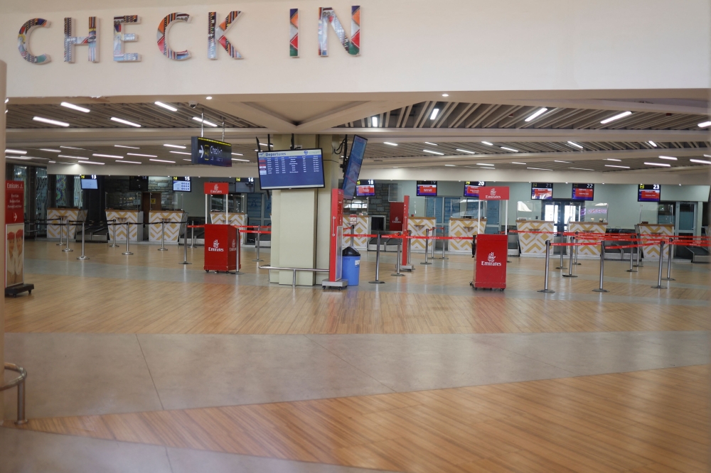 Empty check-in counters seen inside the departures of the Jomo Kenyatta International Airport (JKIA) in Nairobi on September 11, 2024 amid a strike by the Kenyan Aviation Workers Union. Photo by SIMON MAINA / AFP