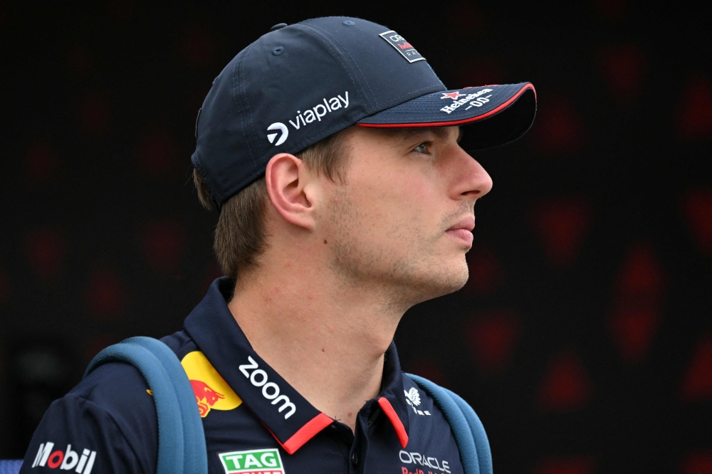 Red Bull Racing's Dutch driver Max Verstappen arrives in the paddock prior to the first practice session ahead of the Formula One Azerbaijan Grand Prix at the Baku City Circuit in Baku on September 13, 2024. (Photo by Andrej ISAKOVIC / AFP)