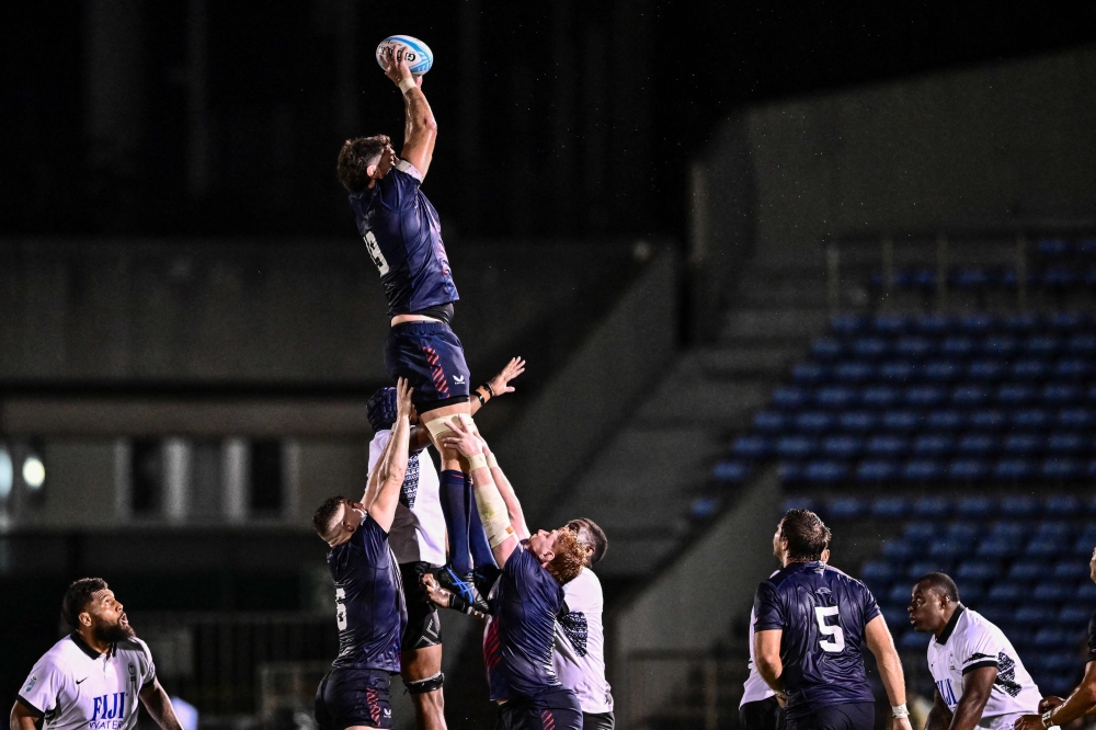 Greg Peterson of the US jumps to catch the ball during the Pacific Nations Cup semi-final rugby union match between Fiji and the US on September 14, 2024. (Photo by Yuichi Yamazaki / AFP)
 