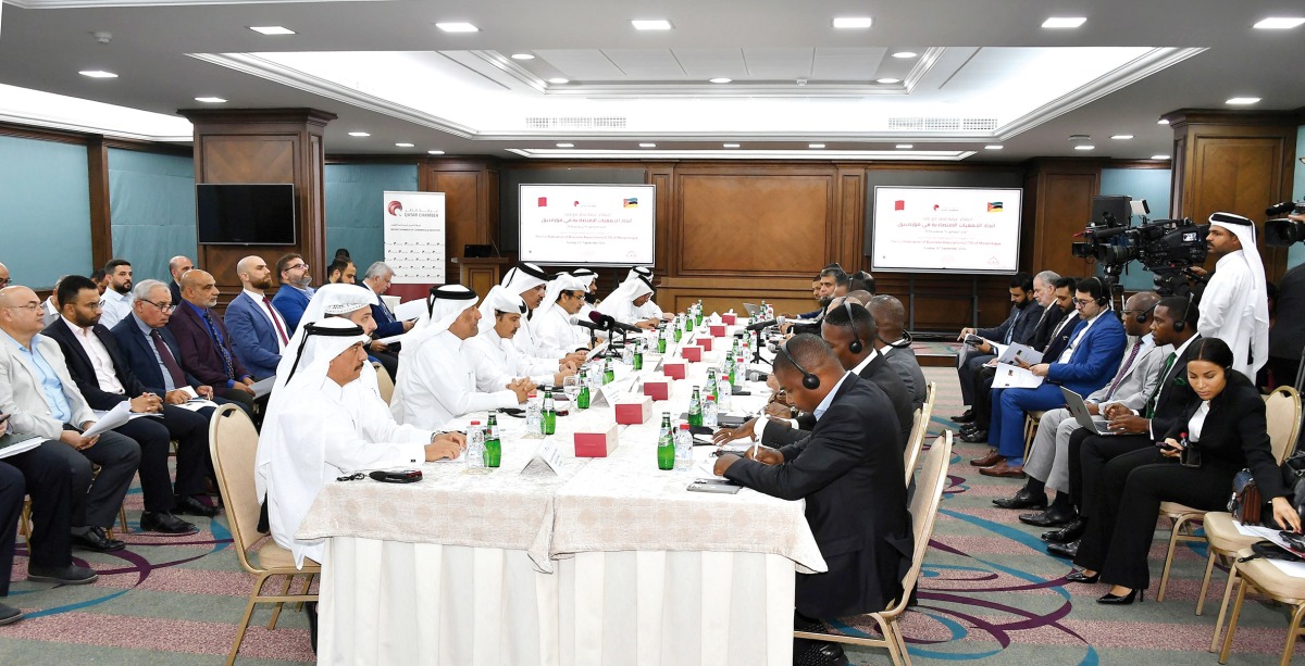 QC and Confederation of Economic Associations of Mozambique officials during the meeting.