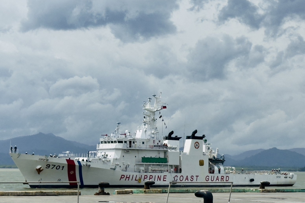 Handout photo from the Philippine Coast Guard (PCG) shows the Philippine Coast Guard ship BRP Teresa Magbanua as it arrives at a port in Puerto Princesa, Palawan. (Photo by Handout / Philippine Coast Guard (PCG) / AFP) 