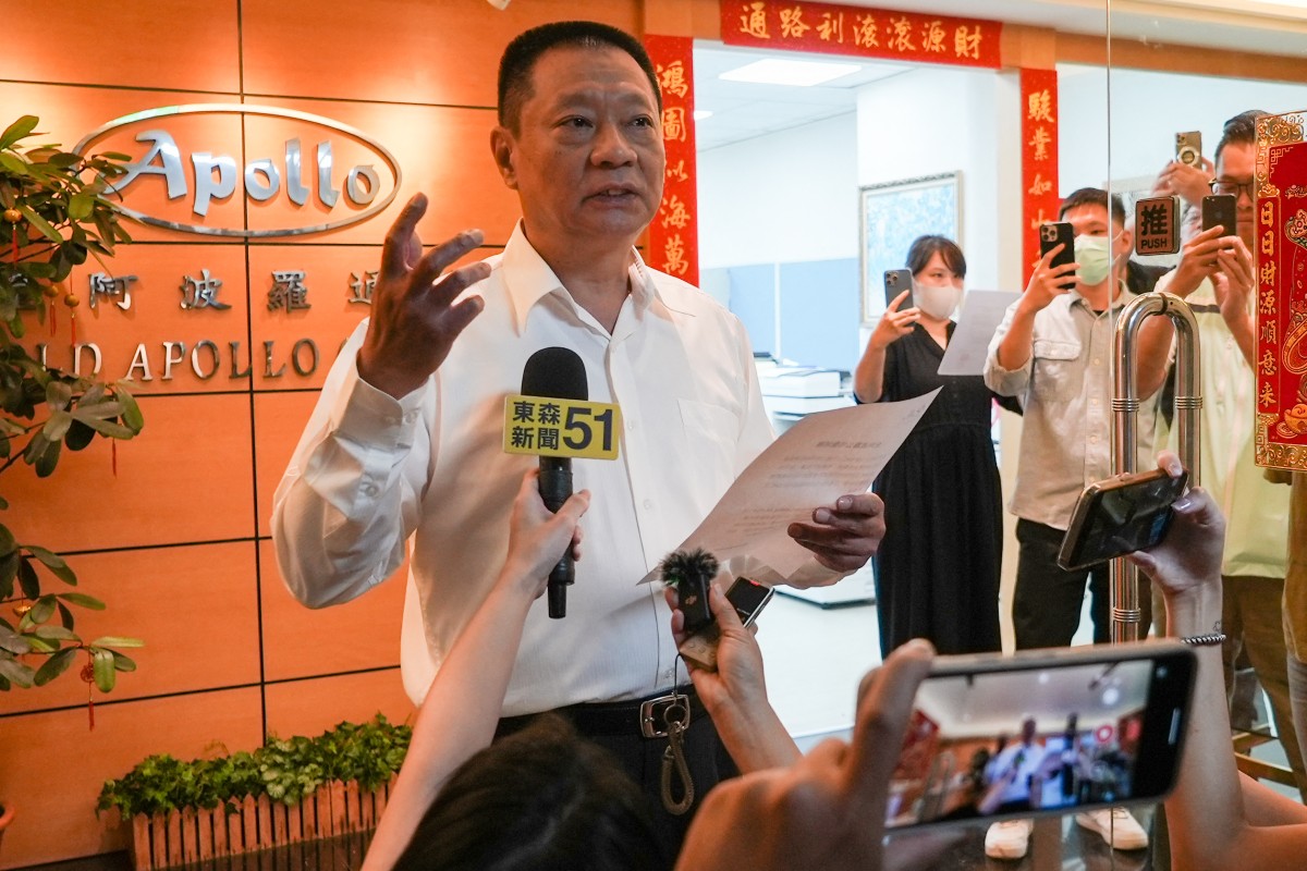 Hsu Ching-kuang (L), head of Taiwanese company Gold Apollo, speaks to the media outside the company's office in New Taipei City on September 18, 2024. Photo by Yan ZHAO / AFP.