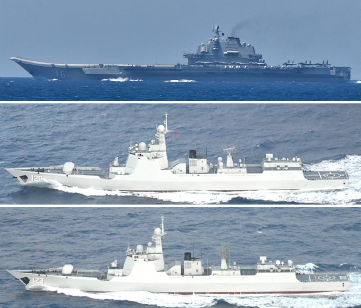 This combination of recent handout photos released on September 18, 2024 by Japan's Ministry of Defence Joint Staff Office Public Relations shows the Chinese aircraft carrier Liaoning (top), and two Luyang III-class missile destroyers (number 120 at centre and number 123 at bottom) at sea in waters near Japan's southern Okinawa region. Photo by Handout / Japan's Ministry of Defense Joint Staff Office Public Relations / AFP.