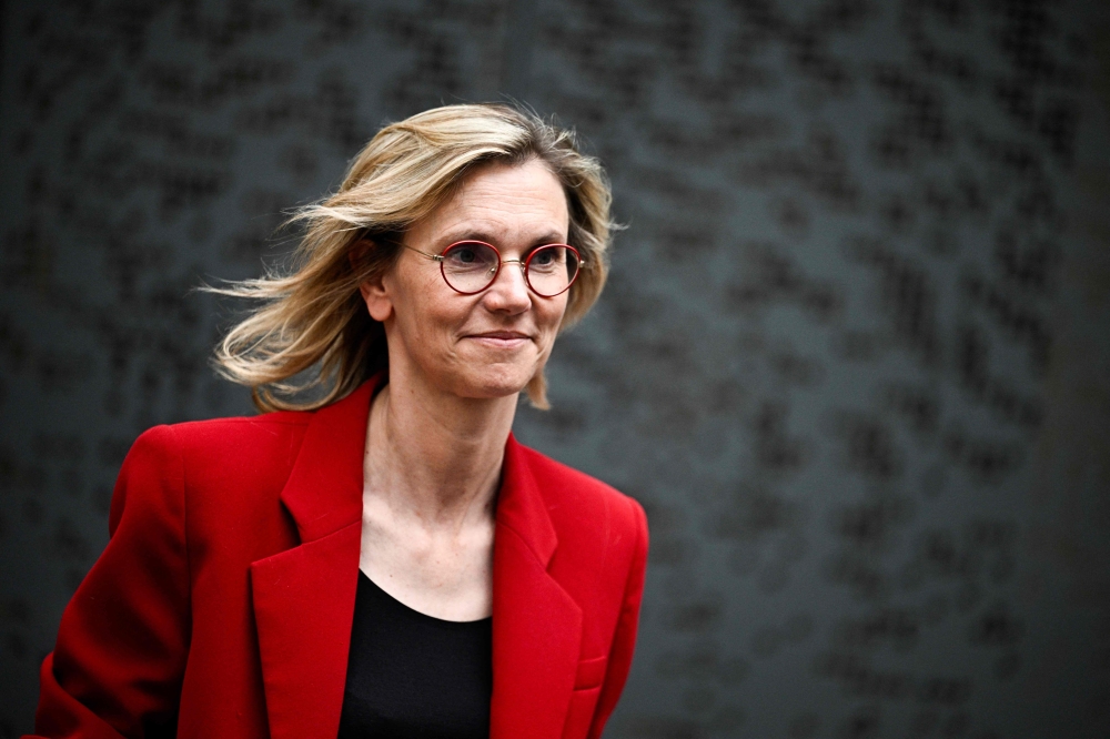 (Files) France's Deputy Minister for Agriculture and Food Sovereignty and newly-elected Member of Parliament for the Renaissance ruling party Agnes Pannier-Runacher leaves after a meeting on the political situation on July 9, 2024. (Photo by Julien De Rosa / AFP)
