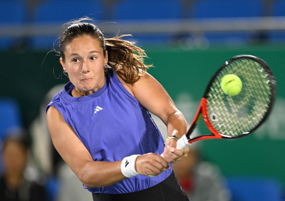 Russia's Daria Kasatkina hits a return to Russia's Diana Shnaider during their women's singles semi-finals match at the Korea Open tennis championships in Seoul on September 21, 2024. (Photo by Jung Yeon-je / AFP)