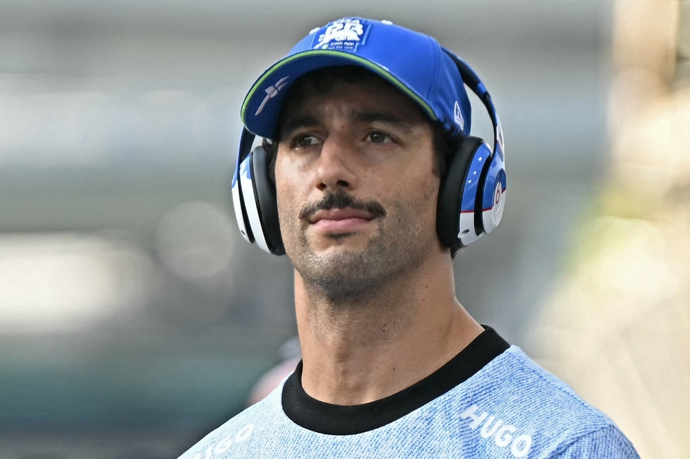 RB's Australian driver Daniel Ricciardo arrives for the drivers' parade before the Formula One Singapore Grand Prix night race at the Marina Bay Street Circuit in Singapore on September 22, 2024. (Photo by Lillian SUWANRUMPHA / AFP)