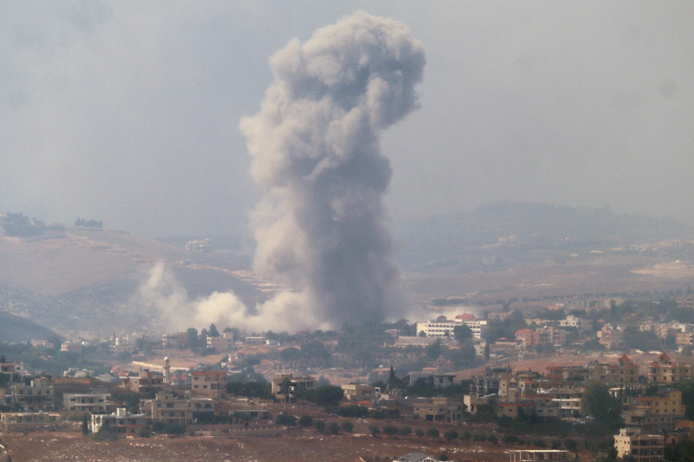 Smoke billows from a site targeted by Israeli shelling in the southern Lebanese village of Khiam in Marjeyoun on September 23, 2024. (Photo by Rabih Daher / AFP)