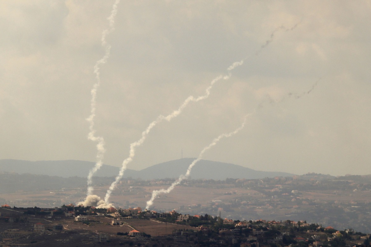 Smoke billows from the site of an Israeli airstrike on Lebanon's southern village of Taybeh on September 23, 2024. (Photo by Rabih DAHER / AFP)

