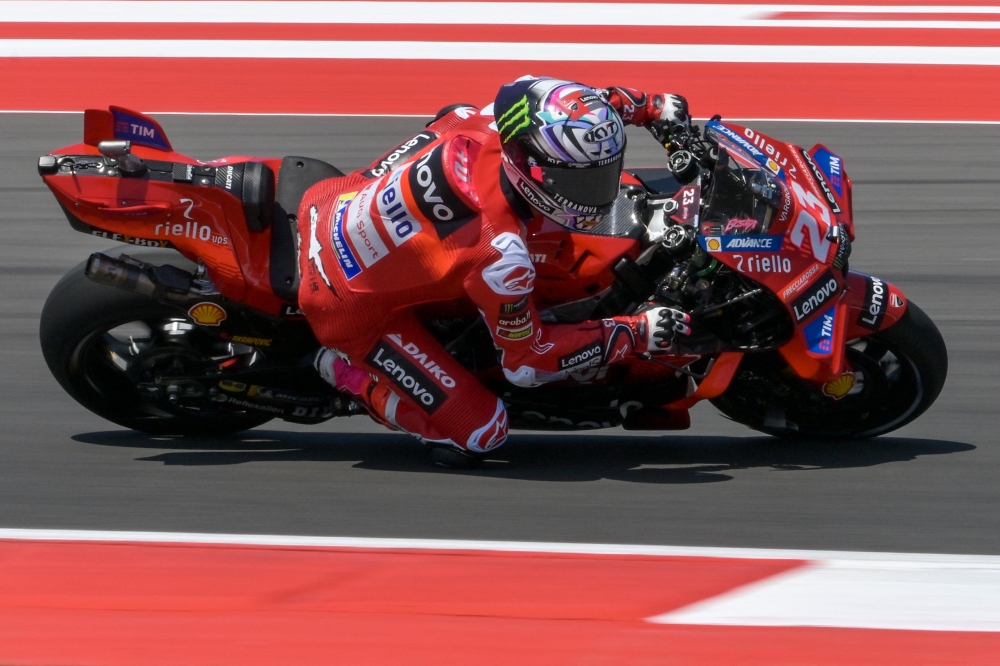 Ducati Lenovo Team's Italian rider Enea Bastianini rides during a free practice session for the 2024 MotoGP race at Pertamina Mandalika International Circuit in Mandalika, West Nusa Tenggara on September 27, 2024. (Photo by BAY ISMOYO / AFP)