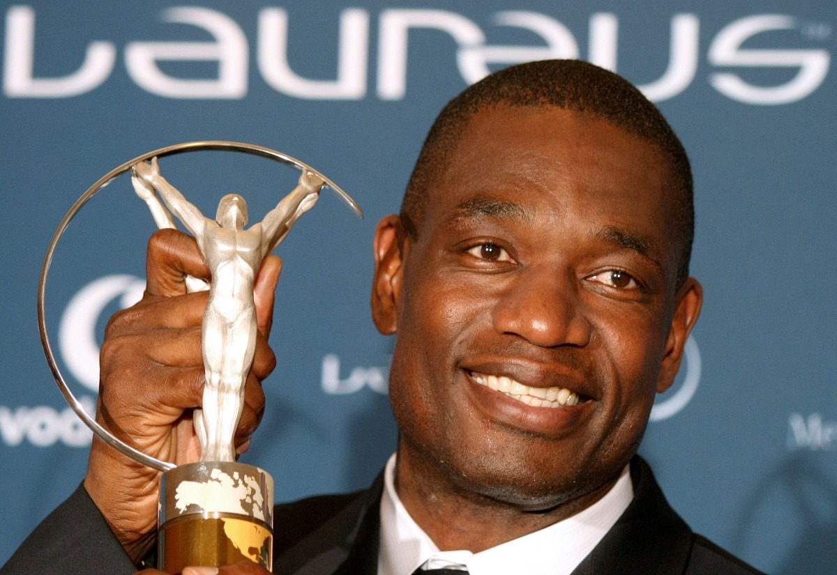 (FILES) Former US basketball star Dikembe Mutombo poses with his 