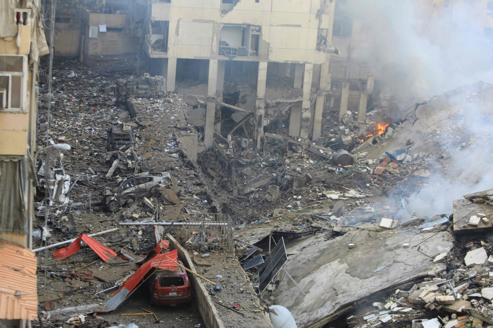 A picture shows a view of the destruction at the site of an overnight Israeli airstrike on the Laylaki neighbourhood in Beirut's southern suburbs on October 1, 2024. (Photo by AFP)