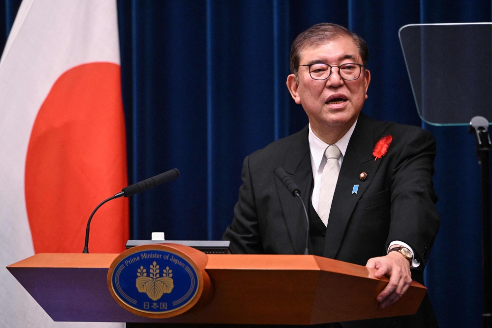 Japan's new Prime Minister Shigeru Ishiba speaks during a press conference at the prime minister's office in Tokyo on October 1, 2024. (Photo by Yuichi Yamazaki / Pool / AFP)