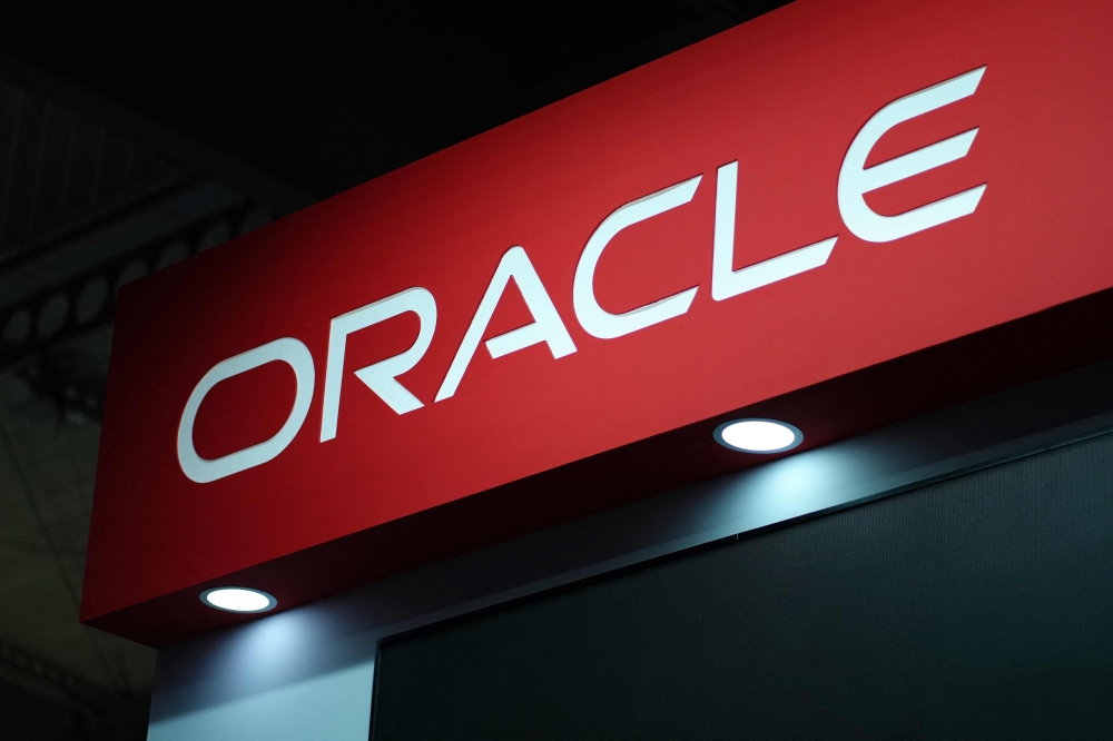 US multinational computer technology company Oracle's logo is pictured at the Mobile World Congress (MWC), the telecom industry's biggest annual gathering, in Barcelona on February 27, 2024. Photo by PAU BARRENA / AFP