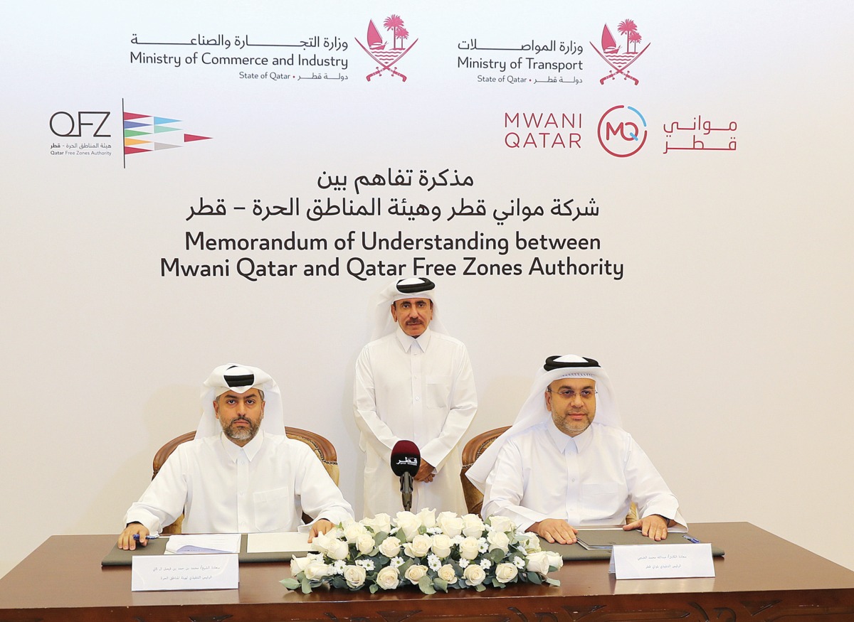 Minister of Transport H E Jassim Saif Ahmed Al Sulaiti (centre) with Qatar Free Zones Authority CEO Sheikh Mohammed bin Hamad bin Faisal Al Thani (left) and Mwani Qatar CEO Capt. Abdulla Mohamed Al Khanji (right) during the MoU signing, yesterday. 