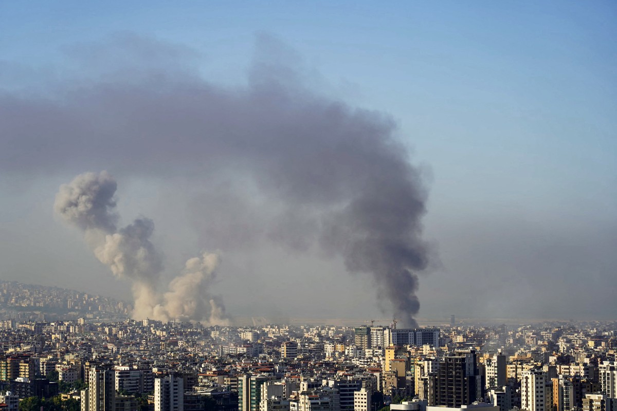 Photo used for demonstration purposes. Smoke rises from the site of an Israeli airstrike that targeted Beirut’s southern suburbs on October 5, 2024. Photo by ETIENNE TORBEY / AFP.