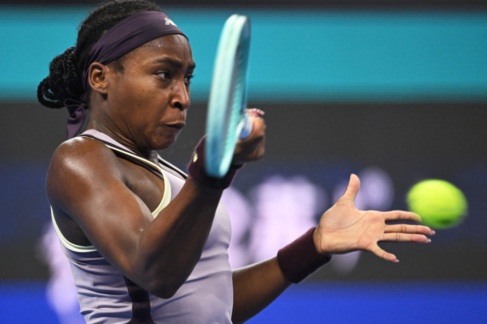 USA's Coco Gauff hits a return to Czech Republic's Karolina Muchova in Beijing on October 6, 2024. (Photo by Greg Baker / AFP)