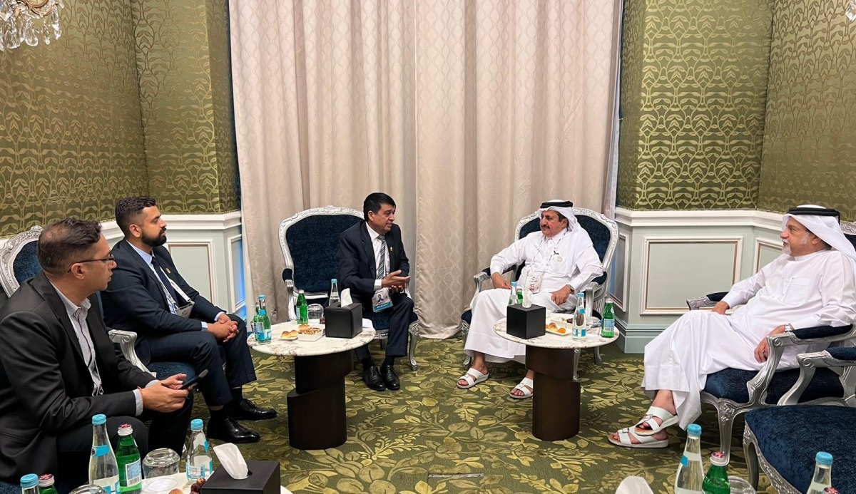 QC Chairman Sheikh Khalifa bin Jassim Al Thani with Chandra Prasad Dhakal, Chairman of the Federation of Nepalese Chambers of Commerce, and Industry and other officials during the meeting.