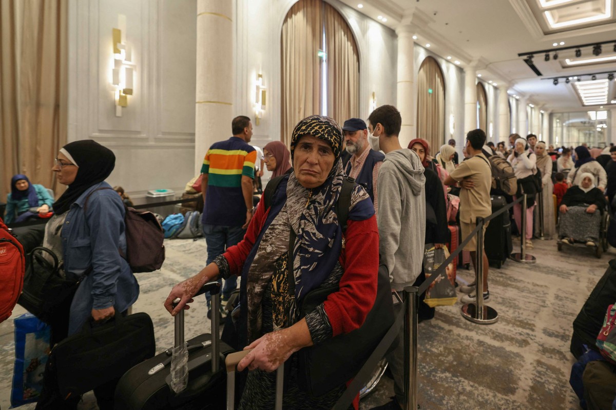 Photo used for demonstration purposes. Turkish passport holders await resgistration at a hotel in the BIEL area of Beirut's waterfront, ahead of their evacuation from Israeli bombing of Lebanon on Turkish Navy ships at the Beirut port on October 9, 2024. Photo by Anwar AMRO / AFP.
