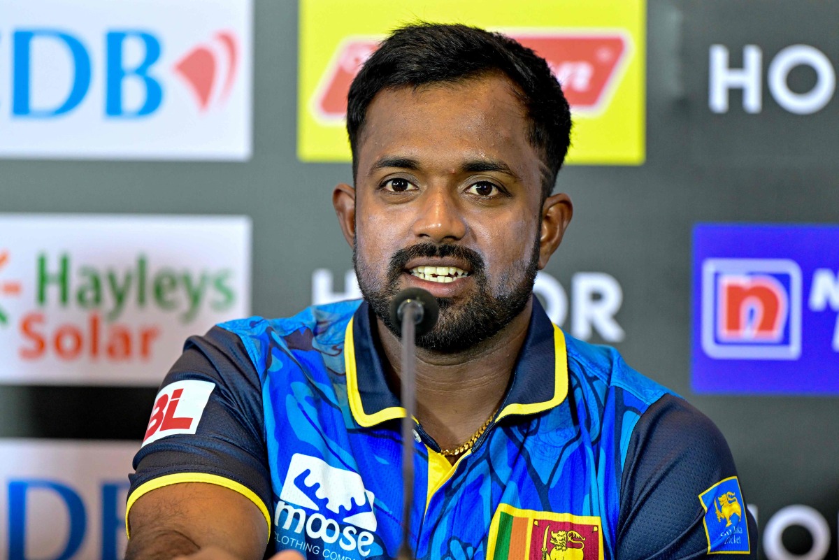 Sri Lanka's captain Charith Asalanka speaks during a press conference at the Rangiri Dambulla International Cricket Stadium in Dambulla on October 12, 2024, on the eve of their first Twenty20 cricket match against West Indies. (Photo by Ishara S. KODIKARA / AFP)
