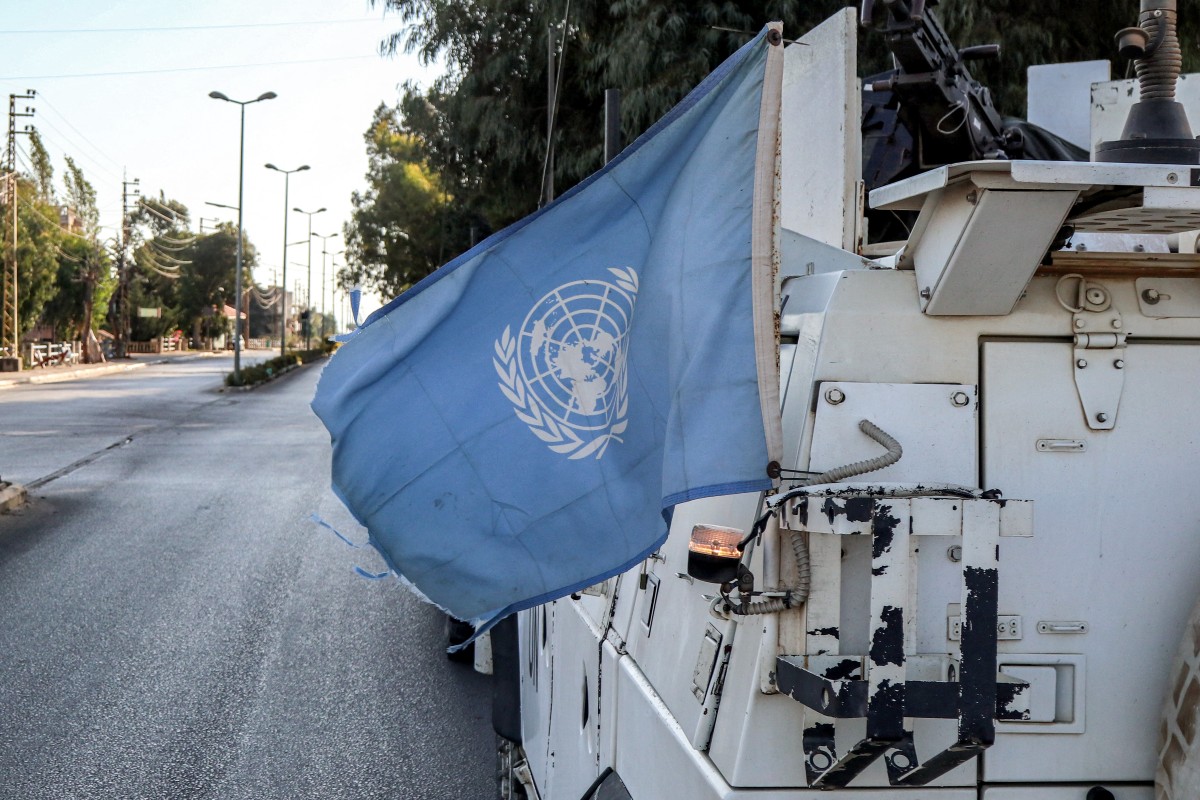 Photo used for demonstration purposes. A United Nations flag flies in the back of one of the armoured vehicles of the UN Interim Force in Lebanon (UNIFIL) during a patrol around Marjayoun in south Lebanon on October 8, 2024. Photo by AFP.
