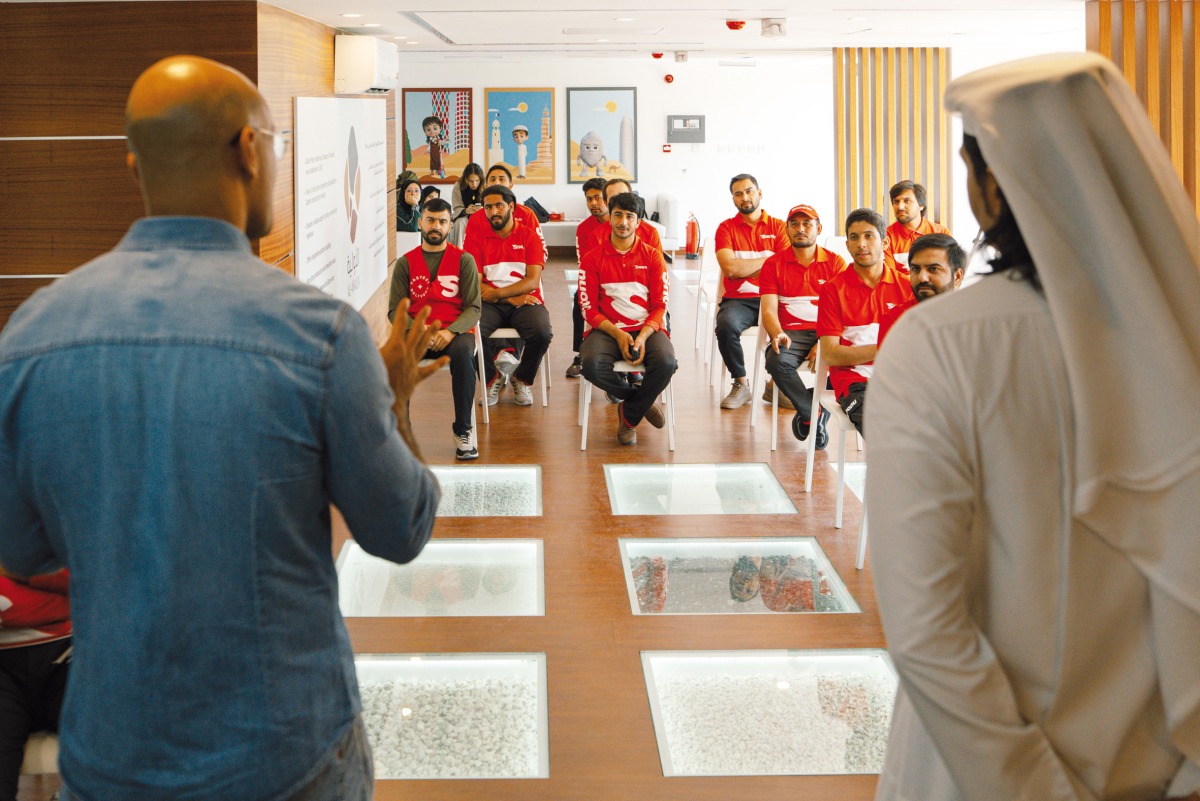 Snoonu officials and staff during a Qatar Social Responsibility Week event.