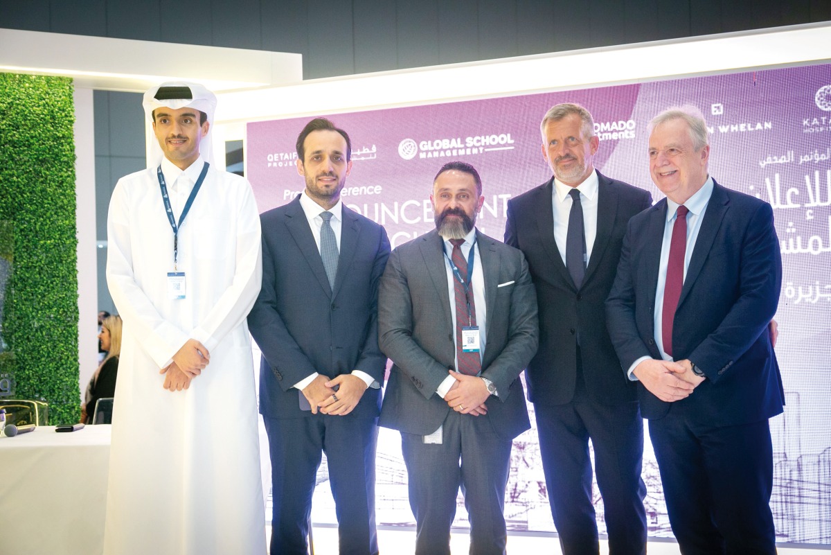 Officials pose for a group photo after the announcement on the second day of Cityscape exhibition.