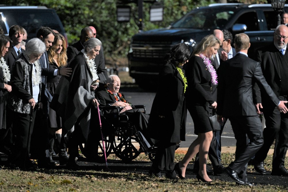 File photo: Former president Jimmy Carter, along with family members, arrives for the funeral of former first lady Rosalynn Carter last year / Washington Post