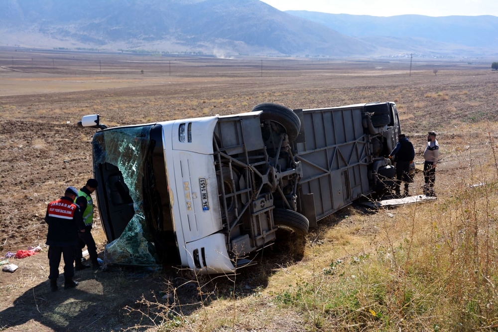 This handout photograph taken and released by the Demiroren News Agency (DHA) on October 17, 2024, shows an tour bus which was carrying Japanese tourists onboard after it overturned near Afyonkarahisar western Turkiye. Photo by Demiroren News AAgency / DHA (Demiroren News Agency