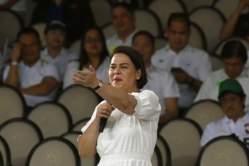 (FILES) Philippines' Vice President Sara Duterte speaks during the kick-off rally for the New Philippines movement at Quirino Grandstand in Manila on January 28, 2024. (Photo by JAM STA ROSA / AFP)

